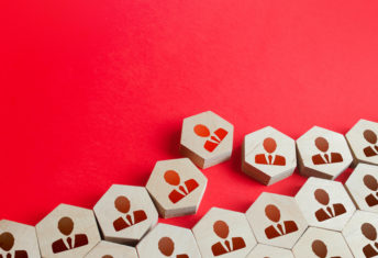 Morgan Stanley’s PCA chief leaves the bank Graphic of wood chips with the outlines of business people.