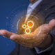 Savano closes oversubscribed direct secondaries fund Image of a hand showing illustration of gears.
