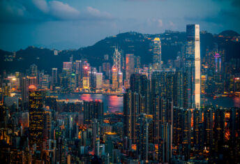 Aquilius appoints former HarbourVest principal as head of PE secondaries, opens HK office Hong Kong skyline at night