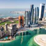 Image of the Abu Dhabi skyline during daytime.
