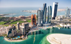 Image of the Abu Dhabi skyline during daytime.