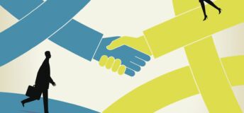 Illustration of two hands shaking with two business people walking by. Source - Getty