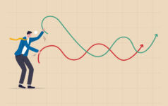 Secondaries activity expected to pick up in H2 after bumpy first half Businessman plays battle rope to control market graph