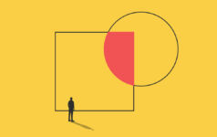 a silhouette of a person stands before a giant square that is overlapped by a circle, their overlap coloured in red