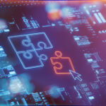 Picture of a computer screen showing a jigsaw puzzle, representing tech M&A.